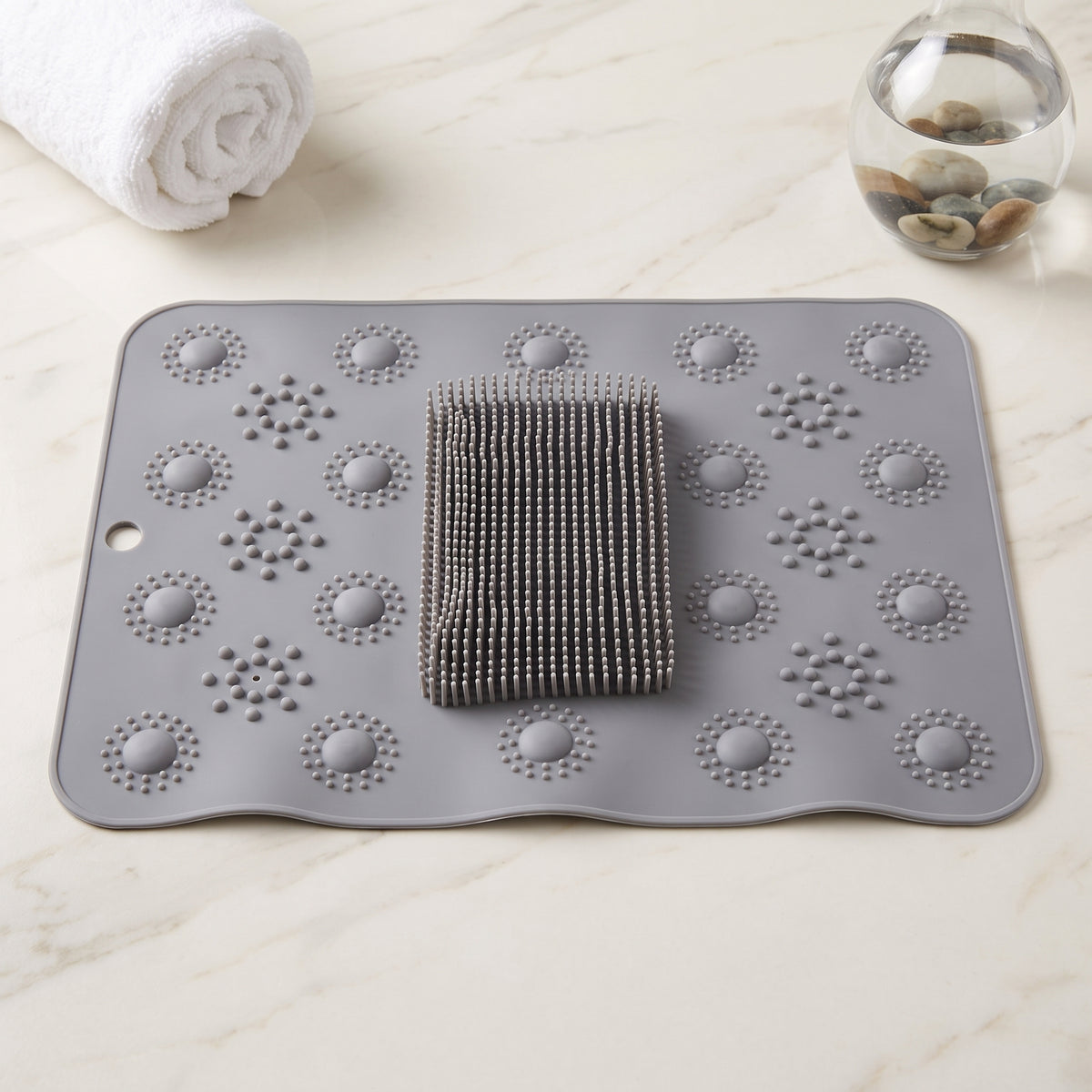 Alfombra exfoliante con esponja gris